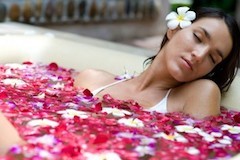 Warm aromatic bath to relieve pain in the neck